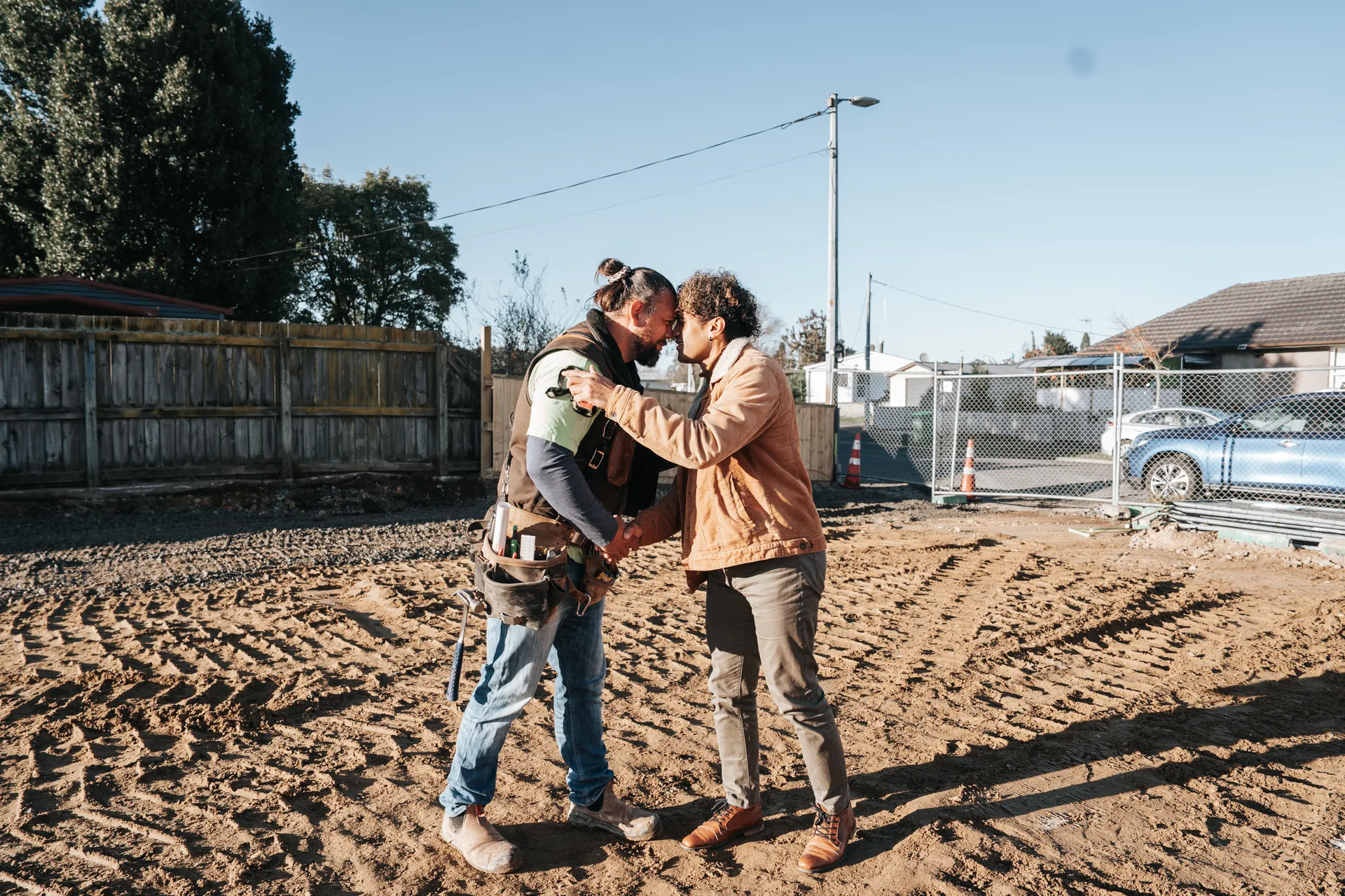 Hongi greeting on construction site